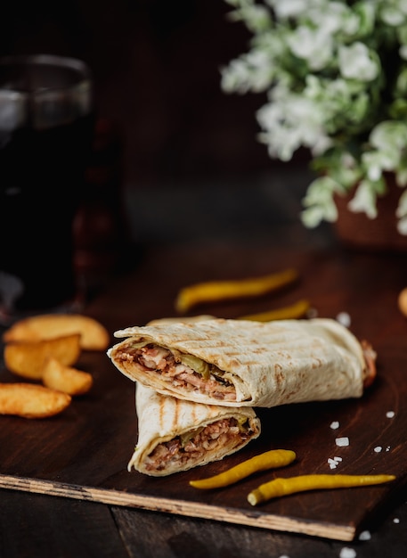 Chicken Doner Wrapped in Lavash on Wooden Cutting Board – Free Download