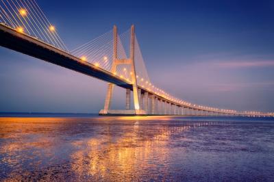 Stunning Sunrise on Vasco da Gama Bridge in Lisbon, Portugal – Free to Download