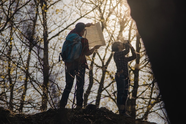 Hikers Exploring Nature with Map and Binoculars – Free Stock Photo for Download