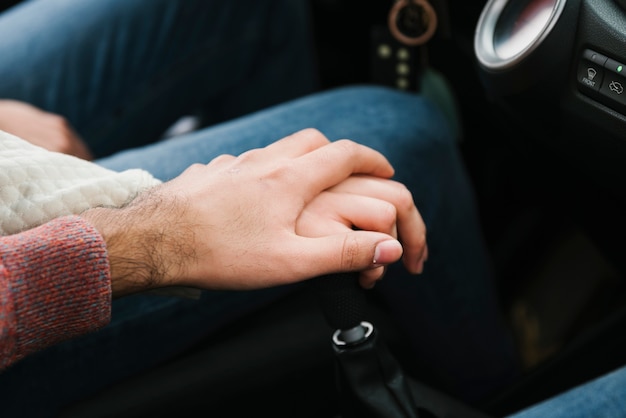 Young Couple Holding Hands in Car – Free Stock Photo, Download for Free