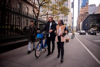 Young Adult Biking Through the City – Free Stock Photo for Download