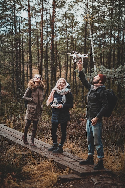 Captivating Autumn Hike: A Small Group Enjoying Nature with a Drone Photo Opportunity – Free Download