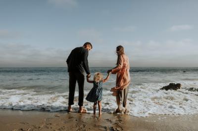 Happy Family Enjoying a Day at the Beach – Free Download