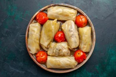 Delicious Meat Meal Rolled Inside Cabbage with Tomatoes – Free Stock Photo for Download