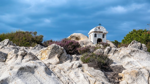 An Old Shrine Near the Aegean Sea Coast Surrounded by Rocks and Bushes – Free Stock Photo for Download