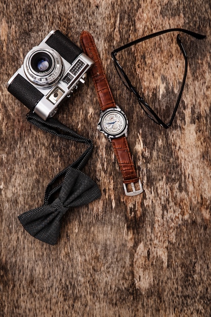 Vintage Camera, Wrist Watch, Glasses, and Bowtie – Free Stock Photo for Download