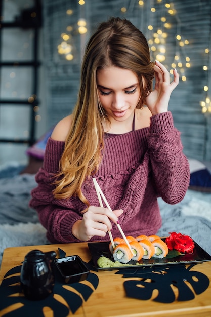 Beaming Woman in Red Sweater Enjoying Breakfast at Home – Free Stock Photo, Download Free