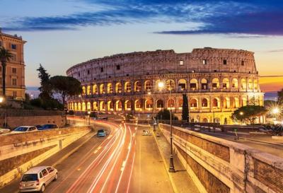 Stunning Sunset Views of the Colosseum and Nearby Roads in Rome, Italy – Free Download