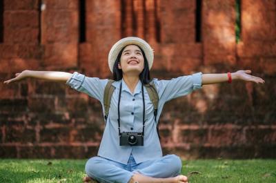 Young Asian Backpacker Female Relaxing at Historic Site – Free Stock Photo, Download for Free