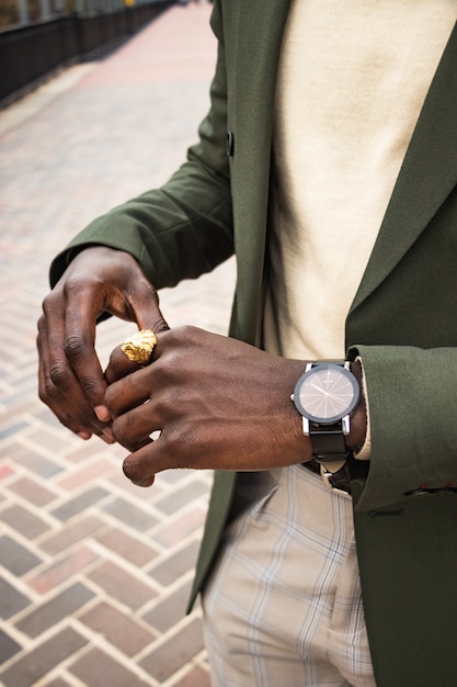 Man in Green Blazer with Gold-Colored Lion Ring and Watch – Free Stock Photo Download