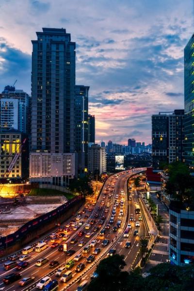 Illuminated City Street and Buildings in High Angle View – Download Free Stock Photo