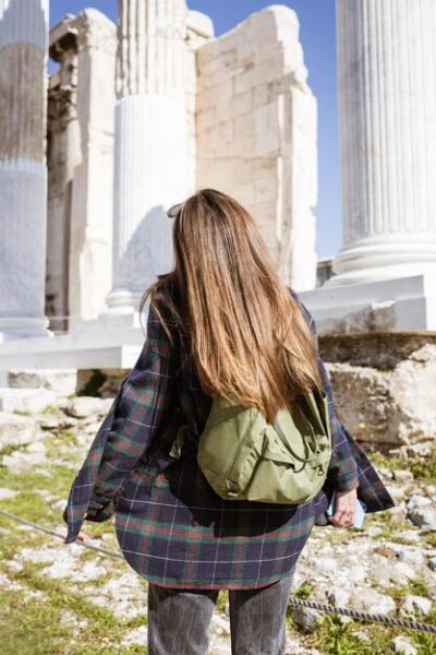 A Woman Walking Through the Ruins of the Acropolis in Athens – Free Stock Photo, Download for Free