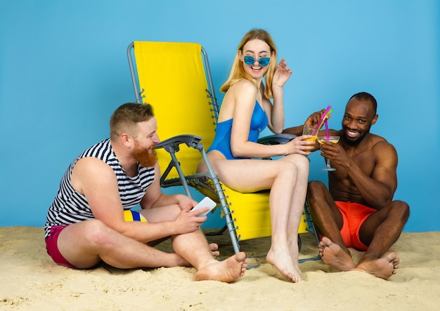 Happy Friends Enjoying Cocktails in a Bright Summer Setting – Free Download