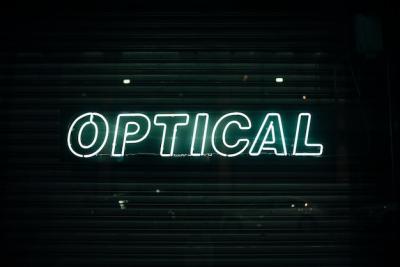 Optical Sign in Neon Lights – Free to Download