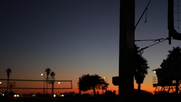 Volleyball Net Silhouette at Sunset on California Beach | Free Stock Photo, Download for Free