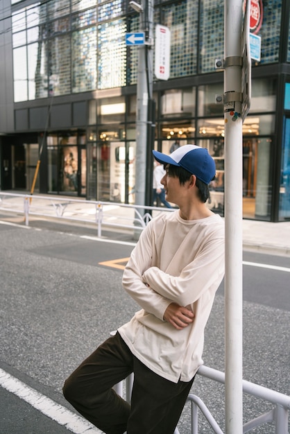 Man Posing in Trucker Hat – Free Stock Photo for Download