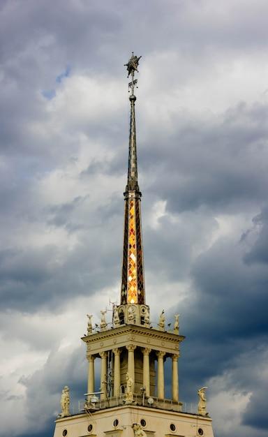 The Top of the Eiffel Tower Against a Stunning Sky – Free Download