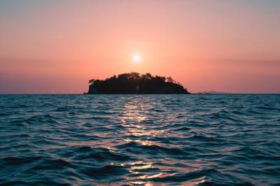 A Small Island in the Middle of the Ocean – Free Stock Photo, Download for Free