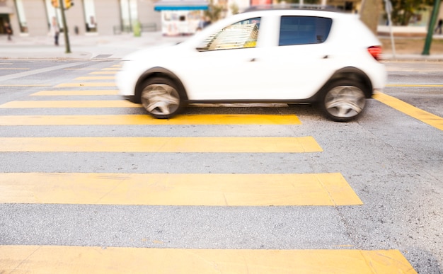 White Car on the Pedestrian Crossing – Free Download