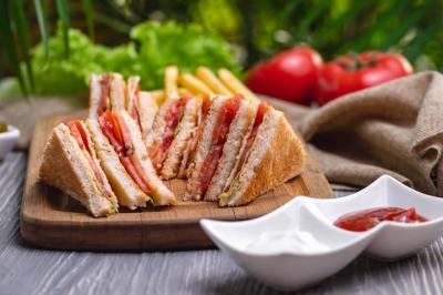 Delicious Club Sandwich with Ham, Chicken, Tomato, Lettuce, Ketchup, and Mayonnaise – Free Download