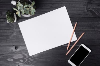 An Overhead View of Colored Pencils and a Smartphone on a Wooden Table – Free Stock Photo Download