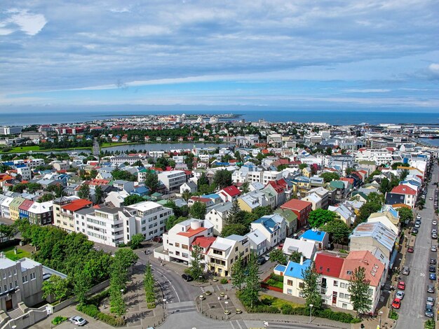 High Angle View of City Buildings by Sea Against Sky – Free Download