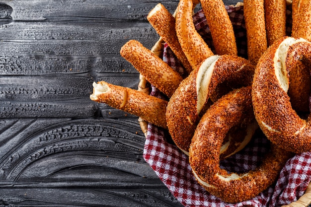 Turkish Bagel in a Basket – Top View on Dark Wooden Surface | Free Download