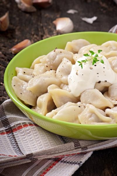 Delicious Meat Dumplings – Russian Boiled Pelmeni on a Plate | Free Download