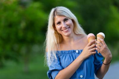 Woman Holding Ice Cream Cones – Free Stock Photo for Download