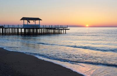 Beautiful Gazebo on a Wooden Pier at Sunset – Free Download