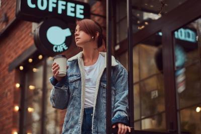 A Beautiful Tattooed Girl in a Denim Coat Sipping Takeaway Coffee – Free Stock Photo, Download for Free