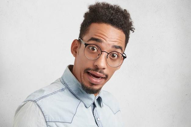 Bewildered Mixed Race Male Nerd with Round Spectacles – Free Download