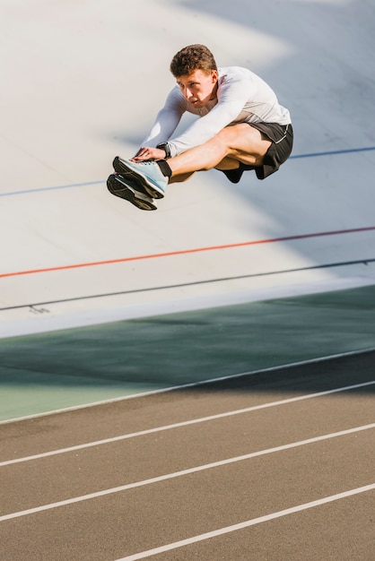 Athlete During Long Jump – Free Download