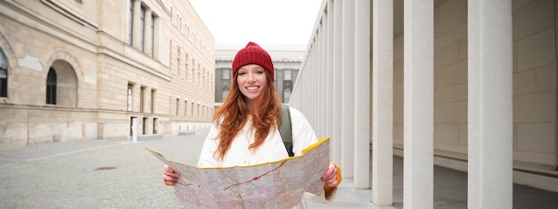 Beautiful Redhead Woman Tourist Exploring Historical Landmarks – Free Stock Photo, Download for Free