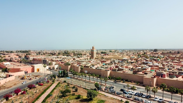 Aerial Drone View of Downtown Marrakesh, Morocco Featuring Ben Youssef Mosque – Free Download