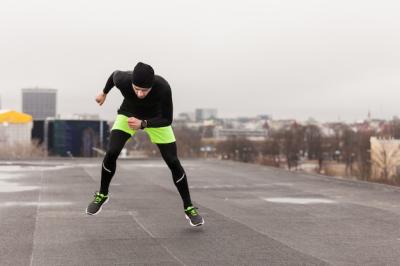 Man Exercising on Rooftop – Free Download Stock Photo