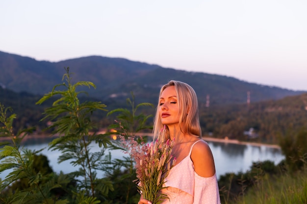 Young Caucasian Woman in Summer Dress Relaxing in Park with Tropical Sea View – Free Download