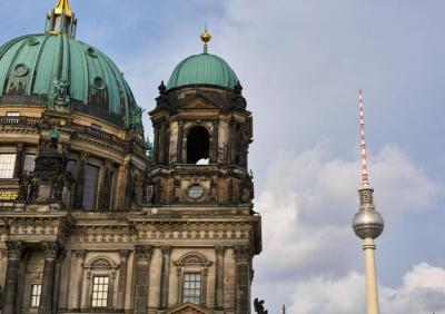 Low Angle View of Cathedral Near Fernsehturm Against Sky – Free Download