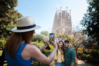 Medium Shot of a Woman Taking Photos with Her Phone – Free Stock Photo Download