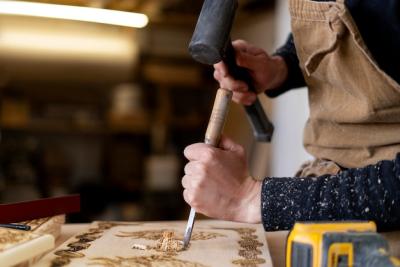 Young Man Working in a Wood Engraving Workshop – Free Stock Photo, Download Free Stock Photo