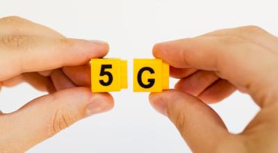 Hands Holding 5G Snap Cubes – Free Stock Photo for Download