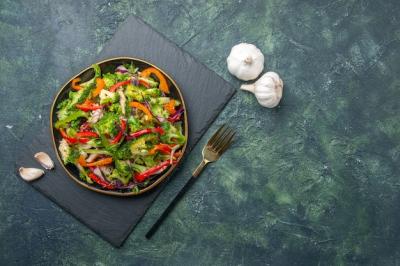 Delicious Vegetable Salad on Black Cutting Board – Free Download