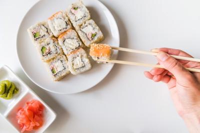 Chopsticks Grabbing Sushi Roll – Free Stock Photo, Download Free