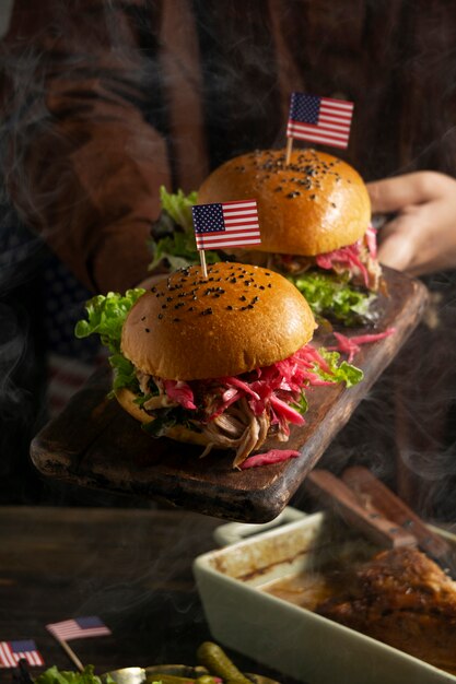 Cook Holding Delicious Burgers – Free Download