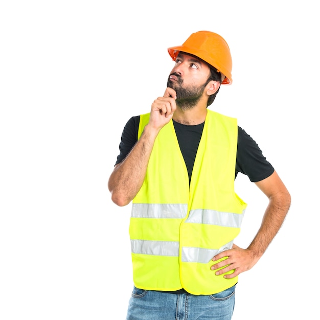 Workman Contemplating Against an Isolated White Background – Free Download