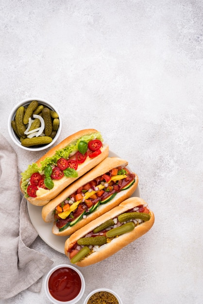 Flat Lay Delicious Hot Dogs with Vegetables – Free Stock Photo for Download