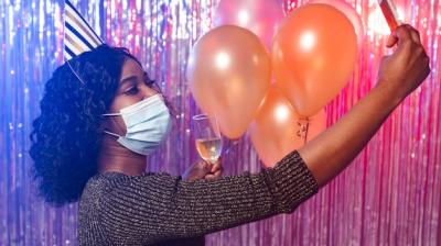 Woman in Medical Mask Taking Selfie – Free Download