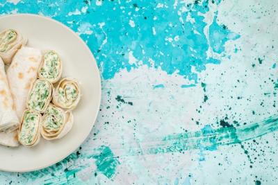 Delicious Vegetable Rolls on Bright-Blue Desk – Free Download