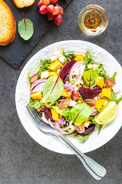 Fresh Vegetable Salad with Beets, Arugula, Red Onion, and Sorrel on a White Plate â Free Stock Photo for Download