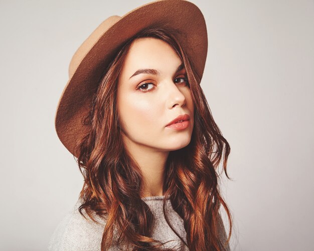 Stylish Female Model in Summer Clothes and Brown Hat – Free Stock Photo for Download